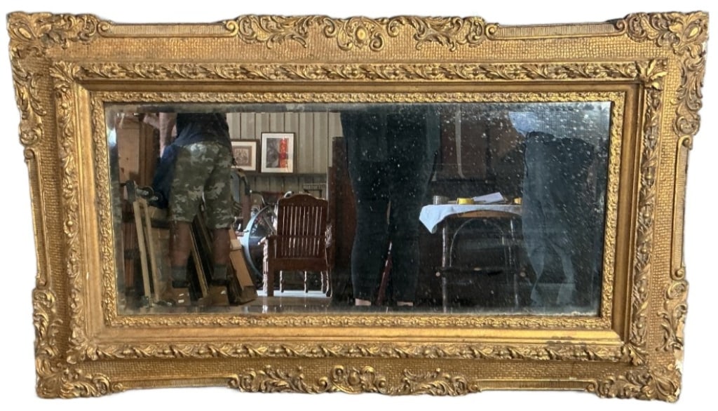 Ornate Giltwood & Gesso Mirror: Ornate Giltwood and gesso mirror. Measures 31.5"h x 53?w. Condition: Some loss of gilt and gesso.