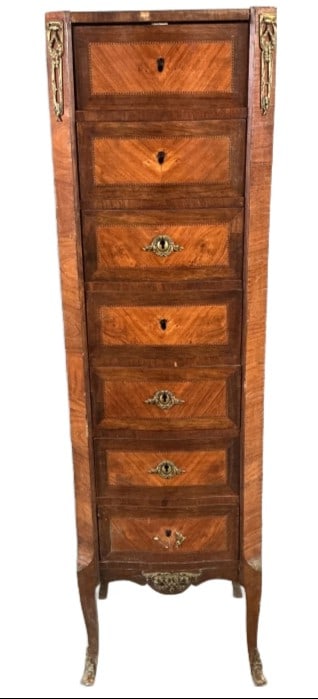Louis XV Style Semainier Chest: Louis XV style semainier chest with brass mounts. Measures 50.5"h x 15"w x 12.25?d. Condition: Some loss to veneer, scratches and chipped wood. Some missing brass mounts.