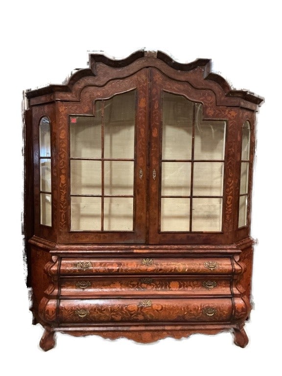 Dutch Marquetry Bombe Bookcase: Dutch marquetry bombe bookcase Measures 92"h x 78.5?w x 21?d. Condition: Some loss of molding, overall wear. Scratches, scuffs, chipped wood, upper part smeels of mold..