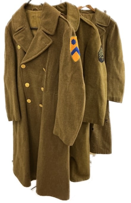 Group of WWII Era US Military Greatcoats: Group of 3 World War II era US military service wool greatcoats. Condition: Some age related wear to all. Moth holes, stains and discoloration.
