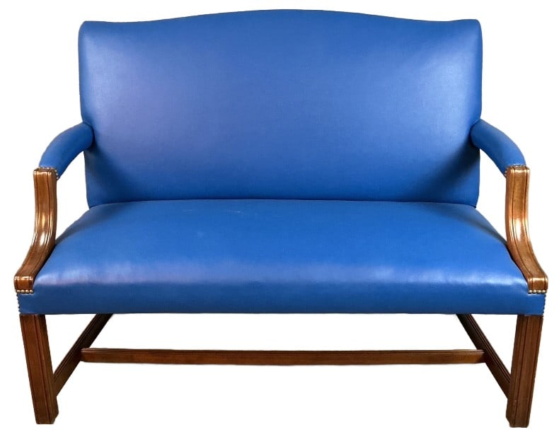 Blue Faux Leather Nailhead Loveseat: Blue faux leather upholstered loveseat with nailhead trim. Measures 39.5"h x 49?w 26?d. Condition: Some scratches and scuffs to wood.