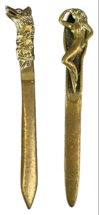 2 Vintage Nude & Wolf Solid Brass Letter Openers: 2 vintage solid brass letter openers. Comprised of: Wolf head and female nude. Measure 9.25"l. Condition: Some scratches.