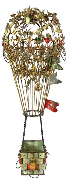Antique Hot Air Balloon Hanging Sculpture: Antique hanging sculpture. Hot air balloon. Paint decorated metal wire. Measures 36"h x 14"dia. Condition: Patina, loss to paint, some bent metal.
