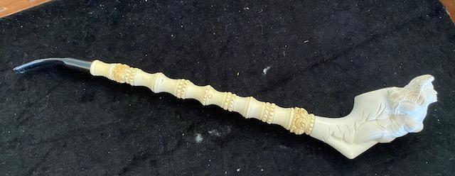 Nude Lady Pipe Meerschaum Long Pipe UNUSED: Nude Lady Pipe. Bowl is the figure of a nude lady, similar to the a Siren on a ship. Comes in three pieces with a floral pattern on stem. Black stem/mouthpiece. 16" long. 20.00 DOMESTIC SHIPPING.