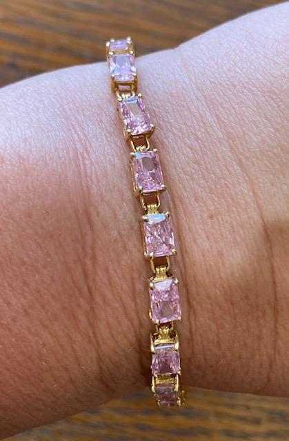 14K gold tennis bracelet W/PINK stones: 14k gold with pink stones tennis bracelet. Rose Willow. 18 stones. Measures 7". FREE DOMESTIC SHIPPING.