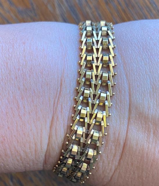 Gold Plated Sterling Tennis Bracelet: Gold plated sterling bracelet. Stamped .925 Milor Made in Italy. Nice band design. Bracelet measures 8". FREE DOMESTIC SHIPPING.