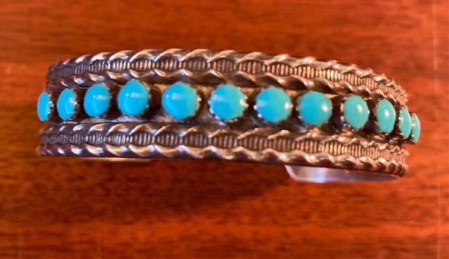 Native American Navajo Indian Turquoise Bracelet: Navajo tested sterling and turquoise bracelet. Unstamped/unsigned. Weight .8 ounces, 2.25" diameter, 1" opening, .5" width. FREE DOMESTIC SHIPPING.