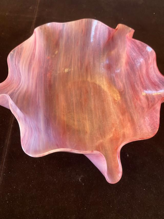 RARE Studio Pink Glass Bowl by Hilda Walton: Studio glass pink glass bowl signed by Hilda Walton. Translucent pink in color with fluted edge. No chips or cracks. Beautiful color and shape. 30.00 DOMESTIC SHIPPING.