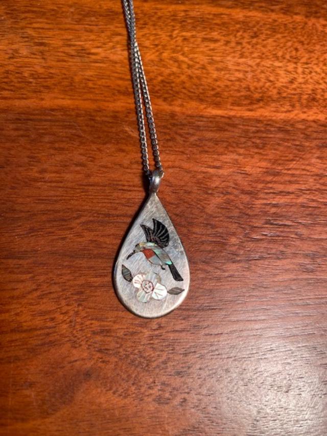 Native American Signed Watchman Necklace: Native American Indian Signed "Watchman" sterling Humminbird pendant with mother of pearl inlay necklace. Approximate 18" sterling chain and 1.25" long pendant. FREE DOMESTIC SHIPPING.