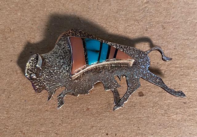 Native American Zuni Buffalo Pin unusal: Native American Zuni buffalo shaped sterling (stamped) pin with pink coral, onyx and turquoise. Signed CS. Measures 2 inches. FREE DOMESTIC SHIPPING.