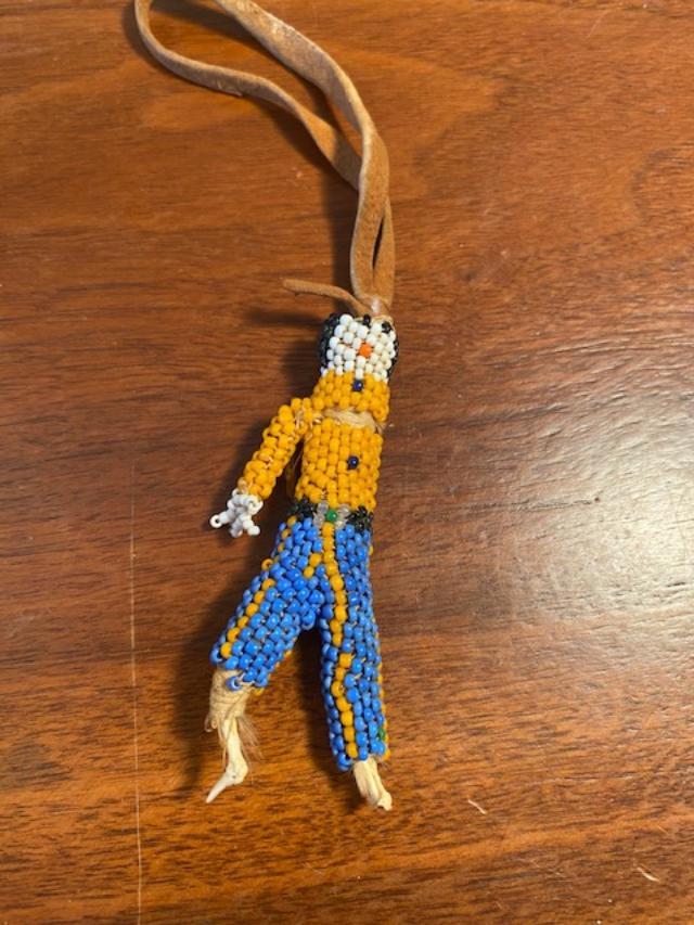 RARE Native American Beaded Chicken Bone Doll: Vintage Native American beaded carved chicken bone doll. Suede hanger. Missing an arm. FREE DOMESTIC SHIPPING.