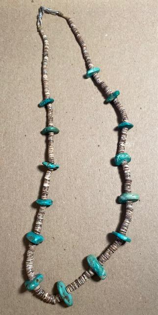 Navajo Shell and Turquoise Necklace: Vintage Native American Navajo shell necklace on cord with turquoise stones. FREE DOMESTIC SHIPPING.