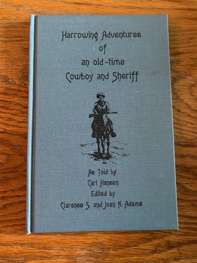 Signed Copy Harrowing Adventures of an Old-Time Cowboy: Harrowing Adventures of An Old-Time Cowboy and Sheriff as Told by Carl Hansen. Edited and Published by Old-Time Publications Clarence S and Joan N. Adams, 1989, Roswell New Mexico 82 pages. Signed by