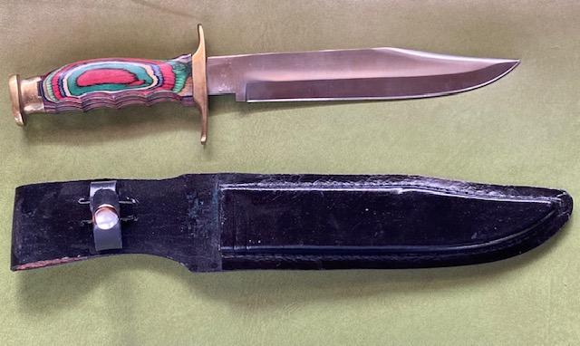 Rainbow Wood Handle Pakistani Knife: Stainless Pakistani Blade with rainbow wood handle in leather sheath. Nice piece, fixed blade. FREE DOMESTIC SHIPPING