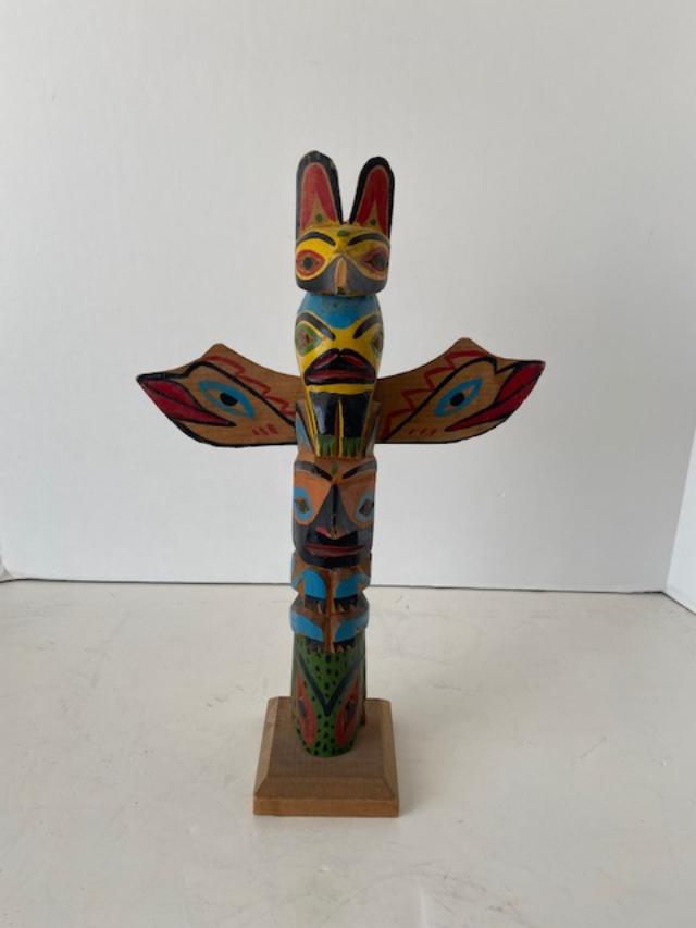 Native American Hand Carved Totem: Native American hand carved and painted totem. Measures 12.5" tall by 8" wide at the wing span. Free domestic shipping.