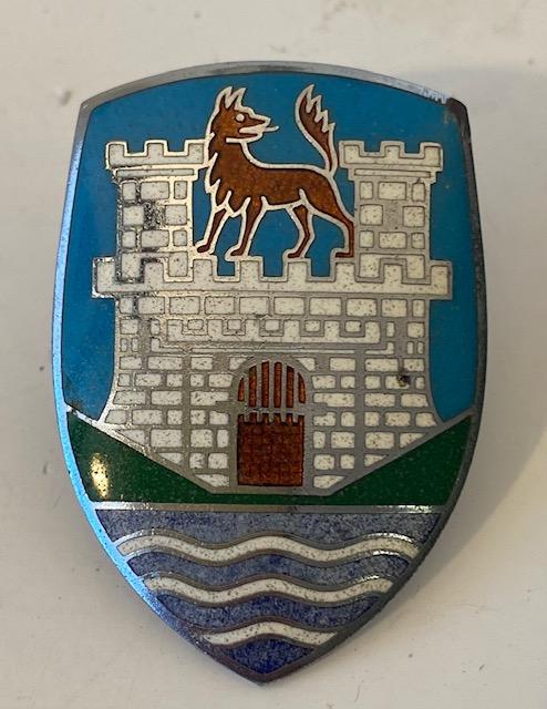 Vintage Volkswagen Emblem: Original vintage German Volkswagen emblem with image of castle and wolf/dog. Back stamped K.S.P. 2"x1.5" FREE DOMESTIC SHIPPING