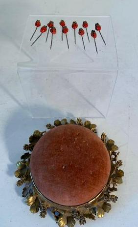 Vintage Pin Cushion and 11 Ladybug Pins: Vintage brass colored pin cushion 3.5" diameter with 11 vintage lady bug pins 1" each. Very unique item. FREE DOMESTIC SHIPPING.