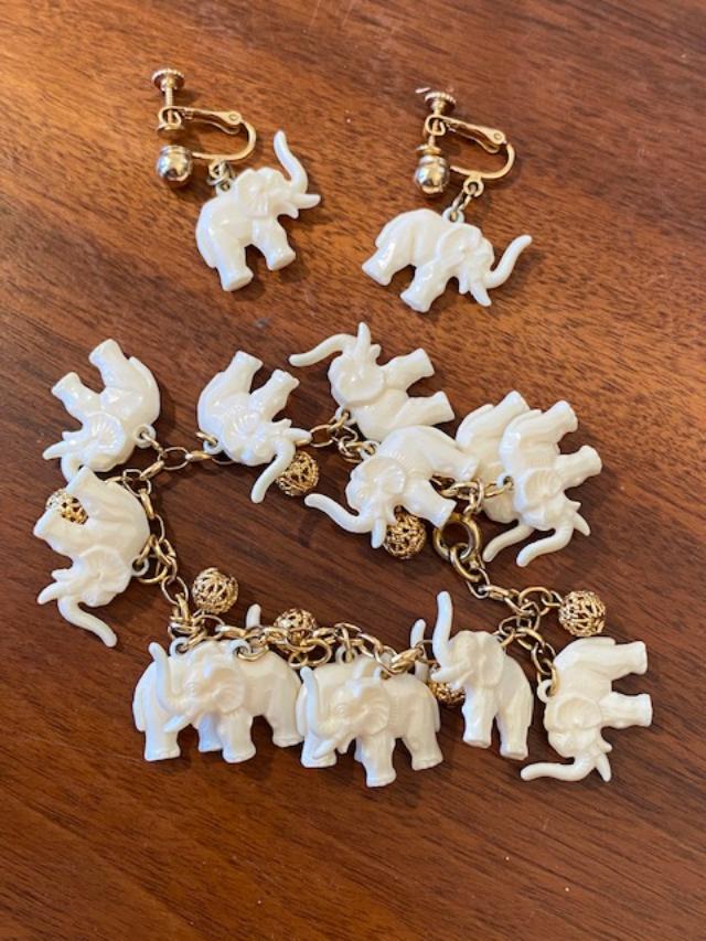 RARE Vintage Napier Celluloid Elephant Lot: Napier vintage celluloid elephant charm bracelet and earrings. Bracelet 7.5" amd screwback earrings 1.5" FREE DOMESTIC SHIPPING