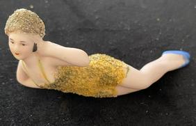 Porcelain Reclining Flapper Figurine ca 1920: Vintage Porcelain reclining flapper lady figurine. Textured paint. 4" Circa 1920's FREE DOMESTIC SHIPPING.