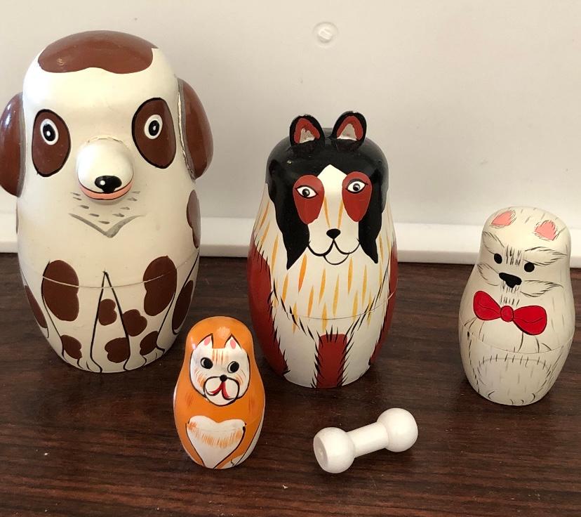 Dog Nesting Dolls: Dog nesting dolls. Four dogs and bone. Tallest 5.5" and smallest bone 1.5" FREE DOMESTIC SHIPPING