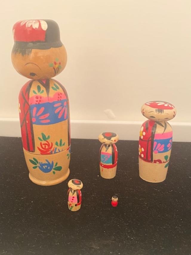 Vintage Japanese Kokeshi Bobble Head Nesting Dolls: Vintage Japanese Kokeshi wood bobble head nesting dolls. Family of five hand painted dolls. Tallest measures 5 inches, smallest measures 1/8 inch. $5 DOMESTIC SHIPPING