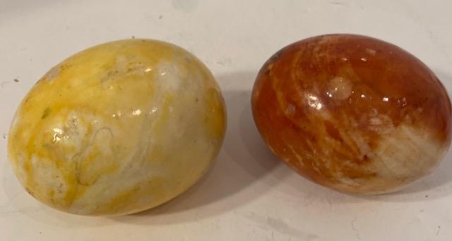 Lot of 2 Stone Eggs Red and Yellow Polished: Lot of 2 healing stone eggs, red and yellow in color. Bottoms are flat to be used as a paper weight. Each measures 3.5". $8.00 DOMESTIC SHIPPING.