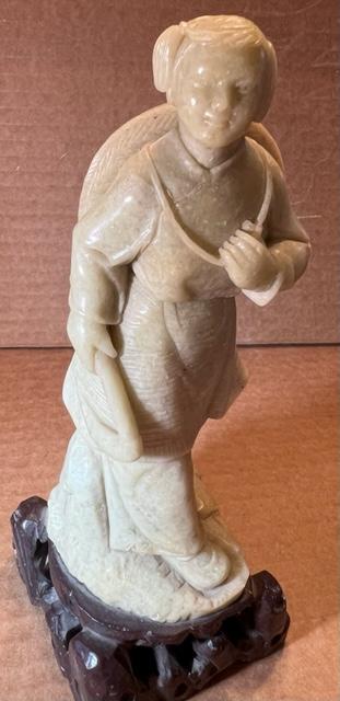 Hand Carved Soapstone Harvesting/Peasant Chinese Woman: Hand carved soapstone Chinese harvesting or peasant woman. Nice, detailed carving. Stand appears to be stone too. Measures 8" tall. Domestic shipping $12