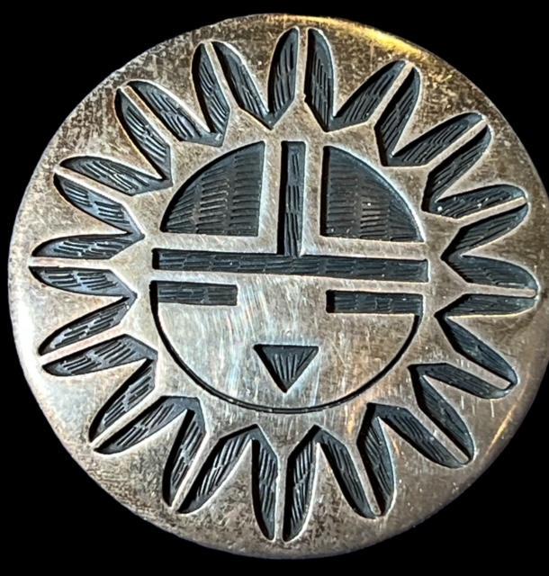 Hopi Silver Sunface Pin/Pendant Signed L. Qumawunu: Native American Hopi Sunface Pin/Pendant. Signed L. Qumaunu. Measures 1.5" and weighs 11.49 g. Domestic shipping $6.