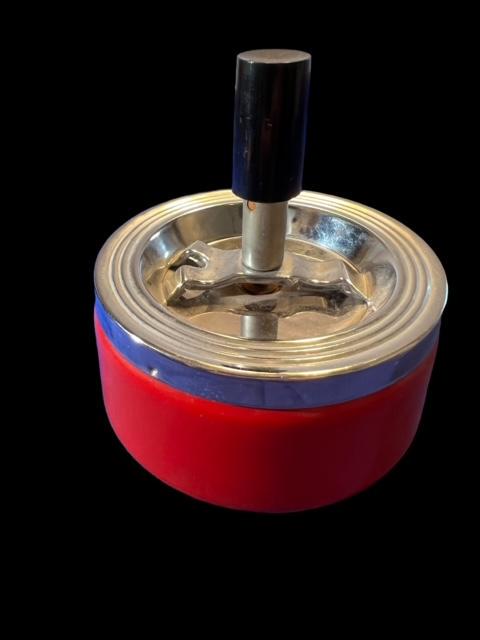Mid Century Roulette Metal Ash Tray: 1950's spinning metal ash tray. Red and chrome. Great working condition. Painted red chrome and black handle. Measures 4.5 inches by 4 inches. Domestic shipping $8.