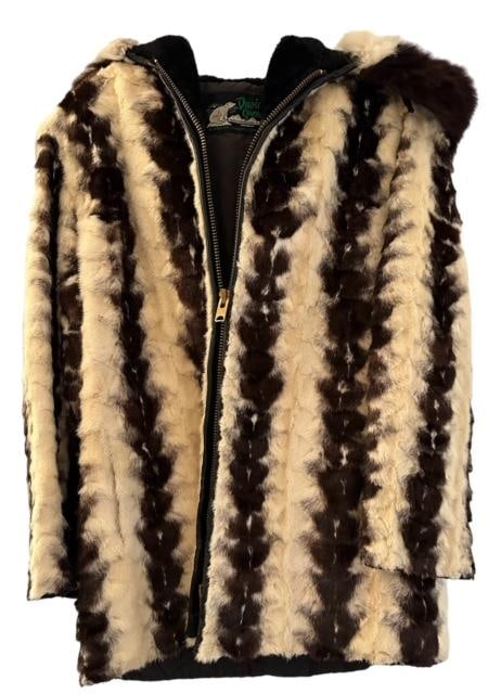 Multi Fur Coat by David Green, Alaska: Fur coat made by David Green, USA, Alaska's leading furrier. Zipper front with good. Multi colored fur. Shoulder to end of sleeve measures 23". Total length of coat measures 28 inches. Approximately 3