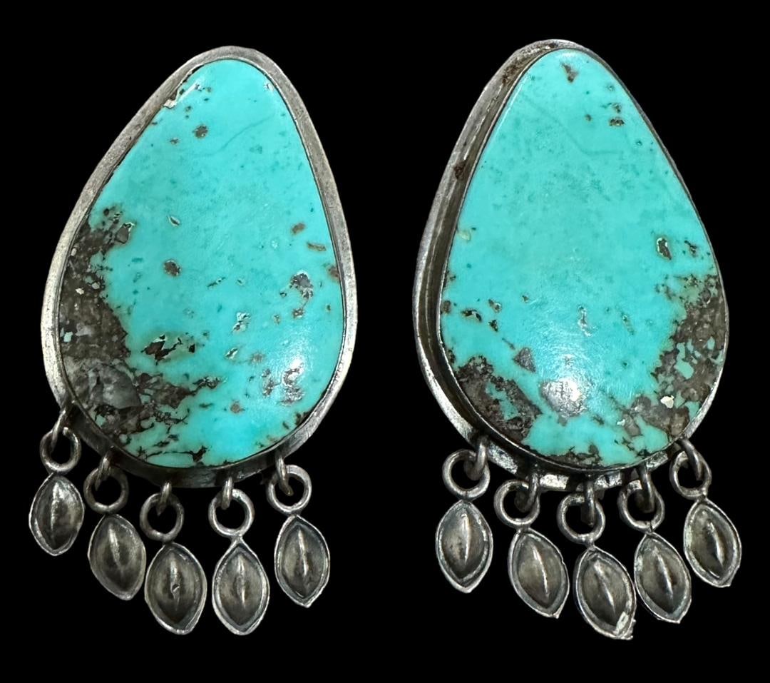 EW Signed Native American Sterling and Turquoise Earrings: EW signed Native American sterling and turquoise earrings. Measure 2.25". Domestic shipping $10. USPS shipping cost only, no additional fees for in-house materials or handling. International shipping
