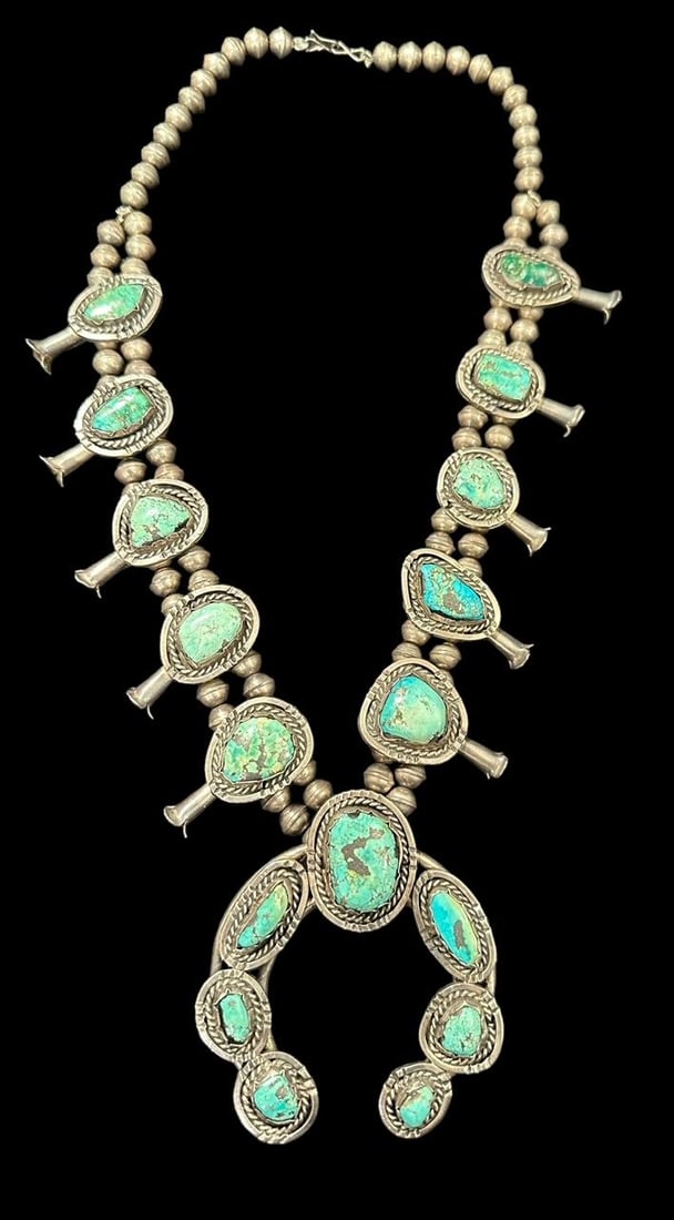 Navajo Naja Design Old Pawn Silver and Turquoise Squash Blossom Necklace: Native American Navajo Naja design squash blossom necklace with turquoise pieces. Necklace measures 22". Pendant measures 3". Unsigned. Domestic shipping $20. USPS shipping cost only, no additional fe
