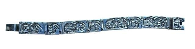 Signed Navajo Sterling Storyteller Bracelet (1 of 4)