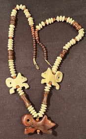 Choctaw Artist Robert W. Kaniatobe Wood and Bone/Vertebrae Wolf Fetish Necklace