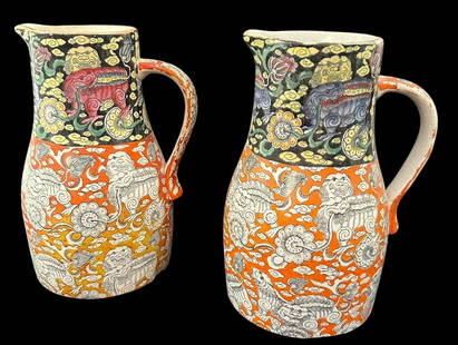 Spectacular Pair of Antique Mason's Ironstone Pitchers Dragon Motif: Very early pair of Mason's Ironstone pitchers. Unusual orange and cobalt colored with Asian and dragon scene. Pitchers are similar but not identical. Measures 9" tall. Domestic shipping $28. USPS