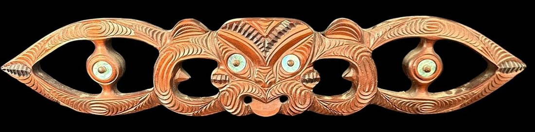 Carved Rotorua Wall Hanging - New Zealand: Carved Rotorua wall hanging with aboriginal design and Abalone eyes. Measures 28.5" x 5.5". Domestic shipping $24. USPS shipping cost only, no additional fees for in-house materials or handling. Inter