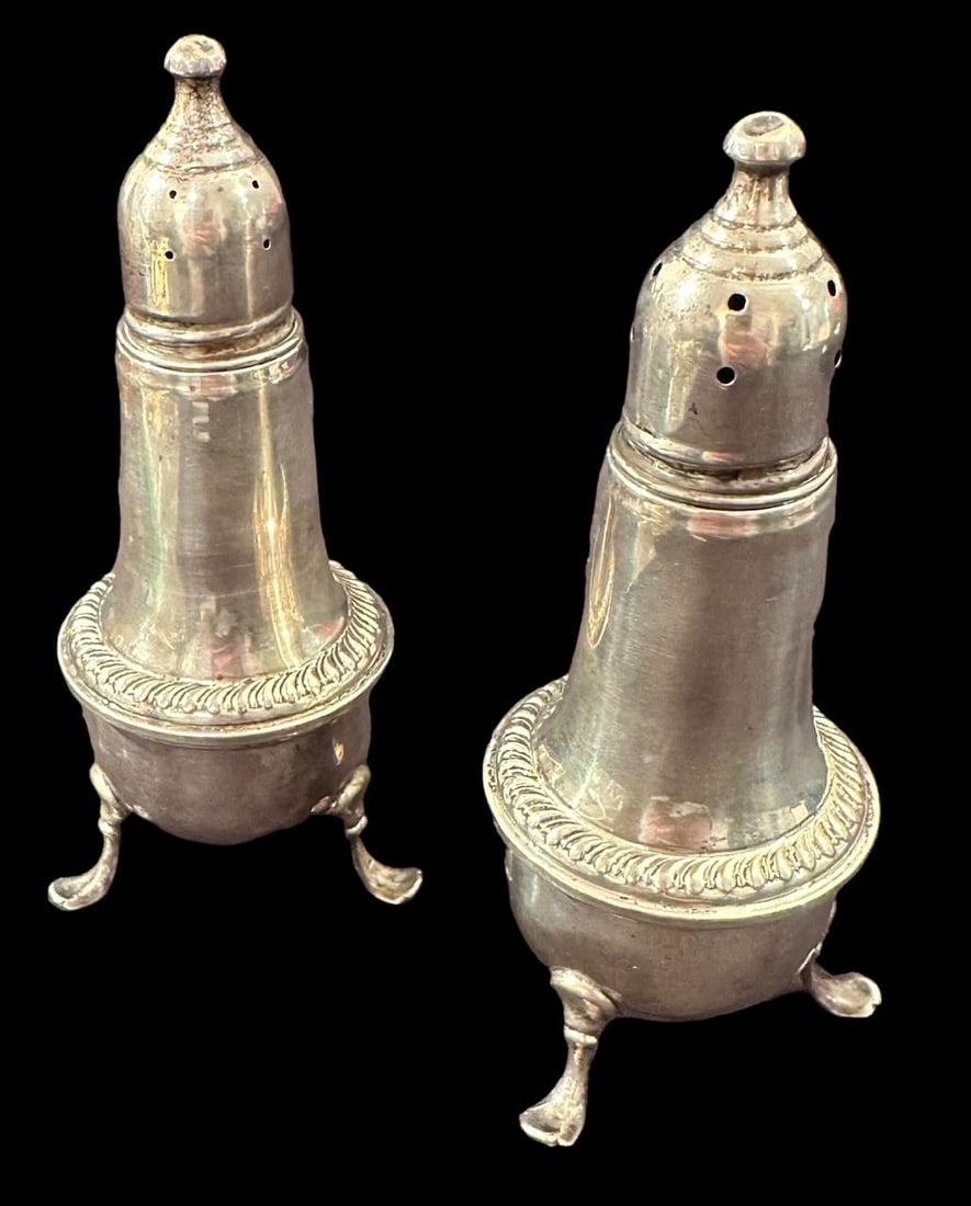 Empire Weighted Sterling Salt and Pepper Shakers: Weighted sterling tri-footed salt and pepper shakers. Signed - Made Empire. Domestic shipping $10. USPS shipping cost only, no additional fees for in-house materials or handling. International shippin