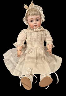 Antique Bisque Sleepy Eye Doll German #167 A 4: Antique bisque sleepy eye doll. Jointed at arm and leg. Signed Made in German #167 A 4. Measures 12". Domestic Shipping $16. USPS shipping cost only, no additional fees for in-house materials or handl