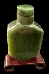 Jade Snuff Bottle with Rosewood Stand: Jade snuff bottle with rosewood stand. Spoon and lid intact. Measures 2.25". Domestic shipping $8. USPS shipping cost only, no additional fees for in-house materials or handling. International shippin