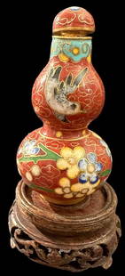 Cloisonne Snuff Bottle with Wood Stand Signed: Cloisonne snuff bottle with wood stand. Signed. Cork and spoon intact. Measures 2.5" tall. Domestic shipping $8. USPS shipping cost only, no additional fees for in-house materials or handling. Interna