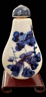 Blue and White Porcelain Snuff Bottle with Stand: Blue and white floral design porcelain snuff bottle with stand. Measures 3" tall with stand. Domestic shipping $8. USPS shipping cost only, no additional fees for in-house materials or handling. Inter