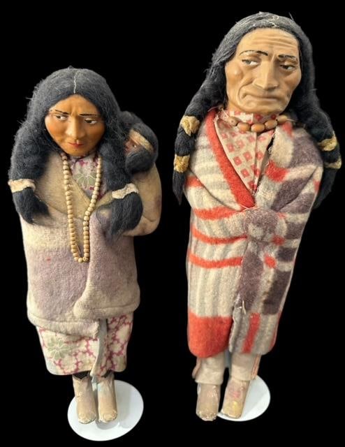 Pair of Antique American Skookum Dolls Squaw and Warrior: Pair of Native American Skookums. Squaw with infant 13" and warrior 14" Plastic faces with wool blanket and clothing. Domestic shipping $20.