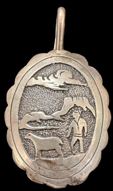 Native American Sterling Storyteller Pendant: Native American sterling (tested, unmarked) pendant. Nice design. Measures 1.5" x 2.25". Domestic shipping $6.