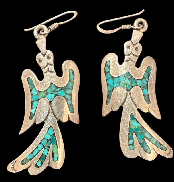 Native American Navajo Sterling and Turquoise Thunderbird Earrings Signed J/L: Native American Navajo sterling earrings with turquoise inlay. Signed J/L and marked sterling. Measures 2". Domestic shipping $6.