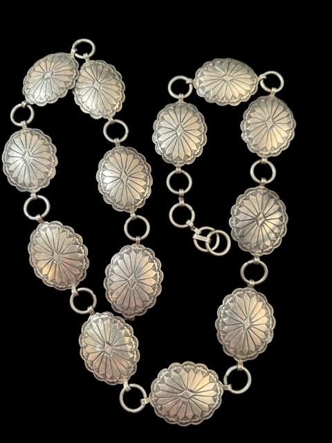 Native American Sterling Concho Belt: Sterling (marked) Concho belt. Includes 13 Conchos that measure 2 x 1.5". Total belt measures 40" long. Unsigned. Weighs 206 g. Domestic shipping $16.