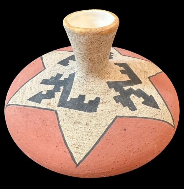 Native American Signed Vase: Native American signed vase with a bent arrow design. Matte finish with a glazed opening. Measures 6" tall by 7.5" wide. Domestic shipping $16.