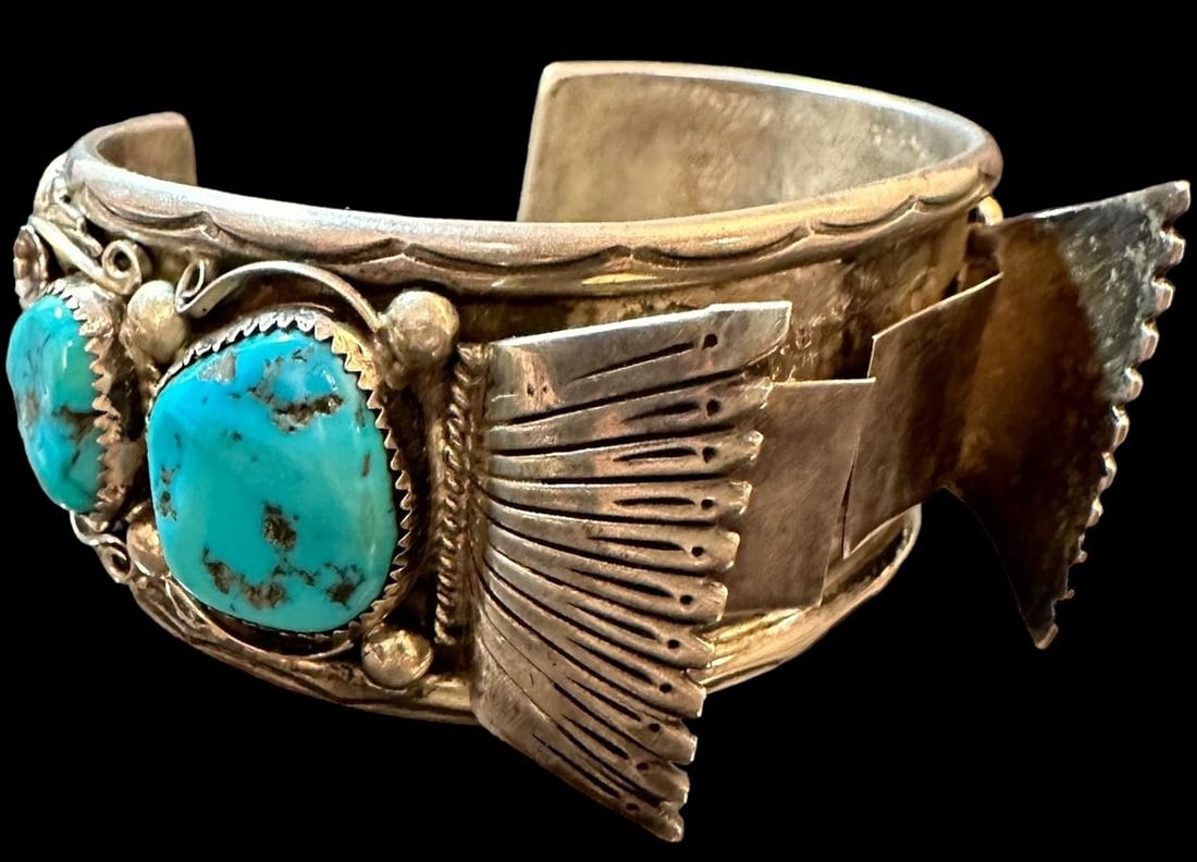 Native American Navajo Signed Sterling and Turquoise Watchband: Native American Navajo sterling and turquoise cuff watchband. Signed J and marked sterling. Total weight 2.6 ounces. Measures 9" around with a 1.25" opening. Domestic shipping $12.