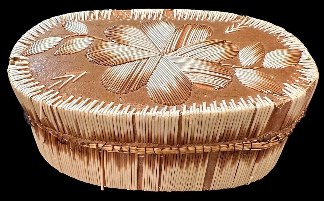Hand Woven Porcupine Quill Basket: Hand woven oval porcupine quill basket with flower designs on cedar lid. Measures 7" x 4.5" x 2.5". Domestic shipping $14.
