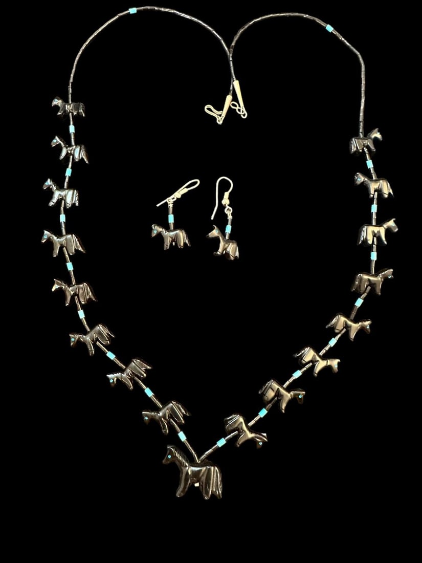 Native American Necklace and Earring Set Horse Fetishes: Native American necklace and earring set featuring a carved horse fetish and turquoise bead spacers. Includes COA that says it is guaranteed Native American. Necklace measures 27". Earrings measures 1