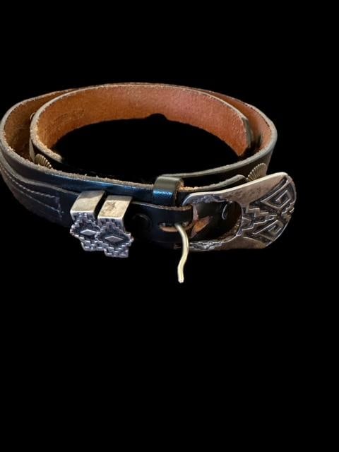 Rogers Sterling Sterling Buckle and Leather Belt: Rogers sterling buckle on leather belt. Marked sterling and M.M. Rogers and copyright 1990. Size 34. Domestic shipping $10.